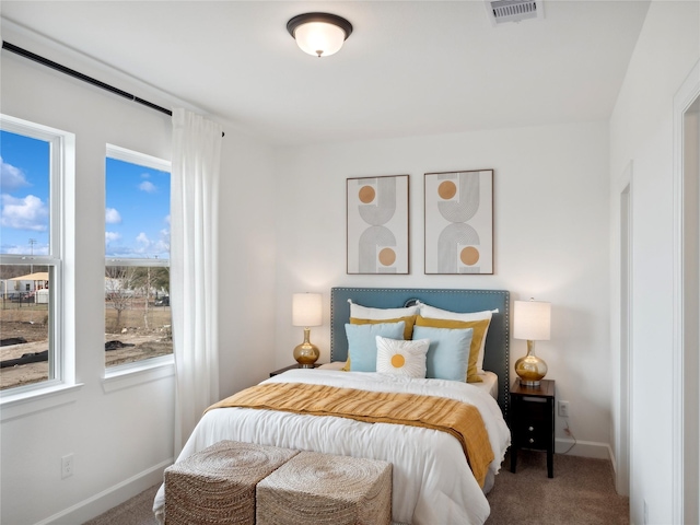 5617 Iris Harvest Dr, Houston, TX 77091 - bedroom featuring carpet flooring and baseboards