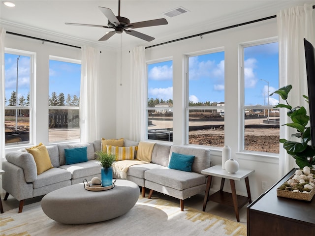 5617 Iris Harvest Dr, Houston, TX 77091 - living area featuring ceiling fan, plenty of natural light, ornamental molding, recessed lighting, and light wood-style flooring