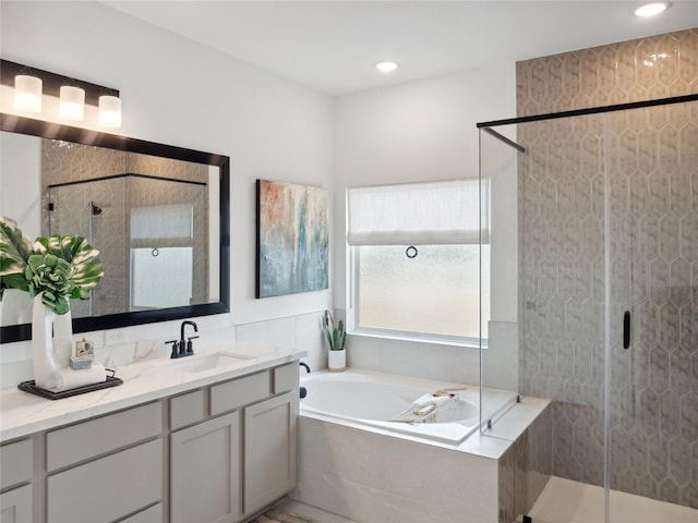 5617 Iris Harvest Dr, Houston, TX 77091 - bathroom with a bath, a shower stall, and vanity