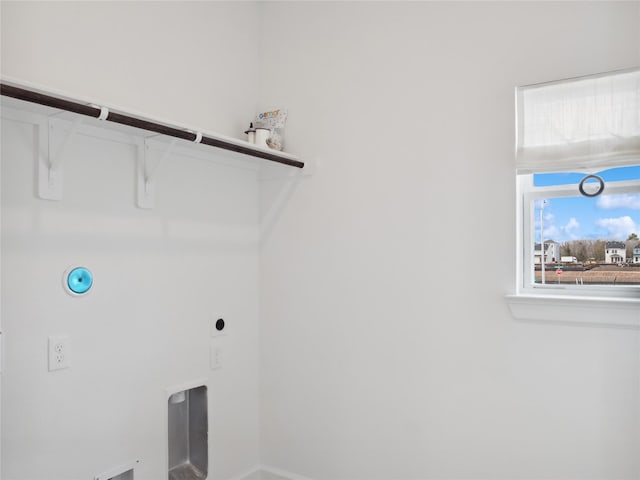 5617 Iris Harvest Dr, Houston, TX 77091 - clothes washing area featuring baseboards and hookup for an electric dryer