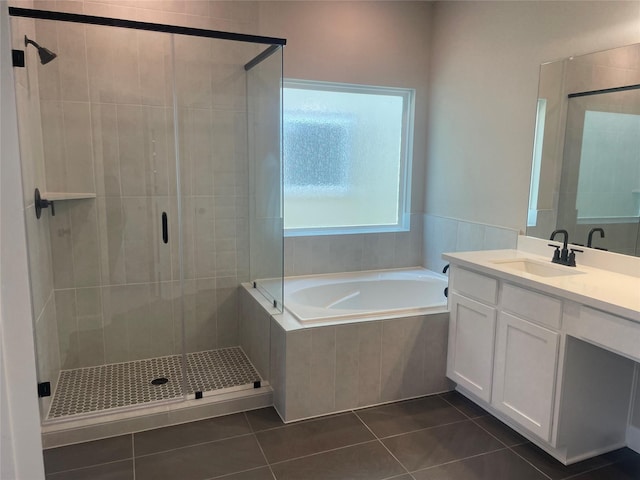 5617 Iris Harvest Dr, Houston, TX 77091 - bathroom featuring vanity, a bath, tile patterned floors, and a shower stall