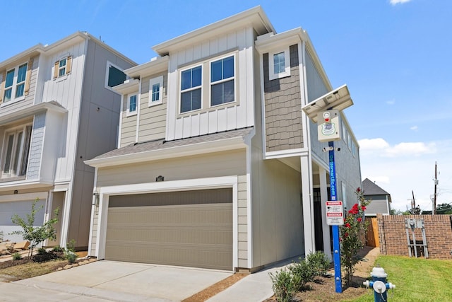 5617 Iris Harvest Dr, Houston, TX 77091 - multi unit property with an attached garage, board and batten siding, and driveway