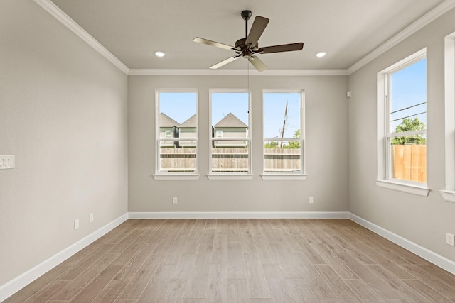 5617 Iris Harvest Dr, Houston, TX 77091 - empty room with ornamental molding, healthy amount of natural light, light wood finished floors, ceiling fan, and recessed lighting