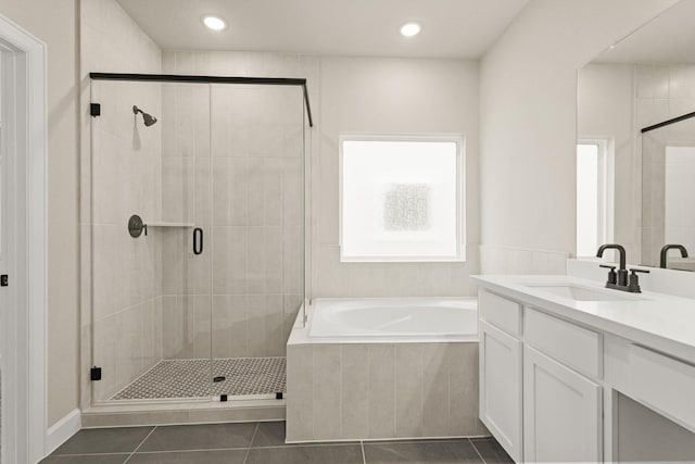 5617 Iris Harvest Dr, Houston, TX 77091 - full bath featuring a bath, vanity, a stall shower, tile patterned flooring, and recessed lighting