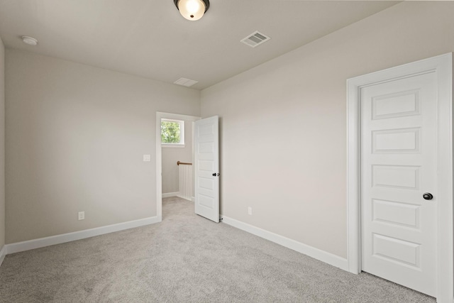 5617 Iris Harvest Dr, Houston, TX 77091 - unfurnished bedroom featuring carpet and baseboards