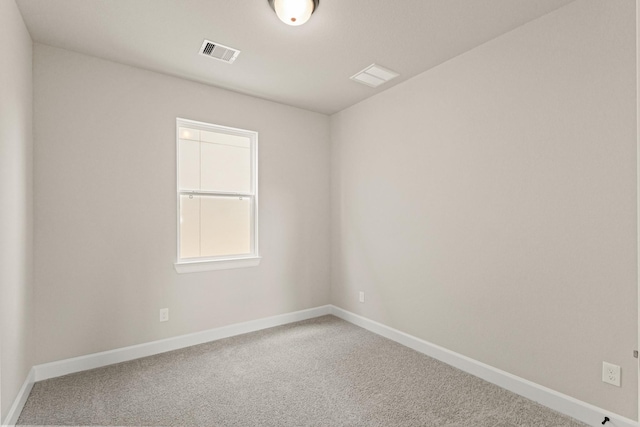 5617 Iris Harvest Dr, Houston, TX 77091 - spare room featuring baseboards and carpet