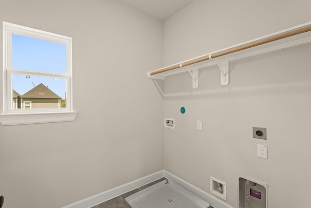 5617 Iris Harvest Dr, Houston, TX 77091 - washroom featuring electric dryer hookup, washer hookup, and tile patterned floors