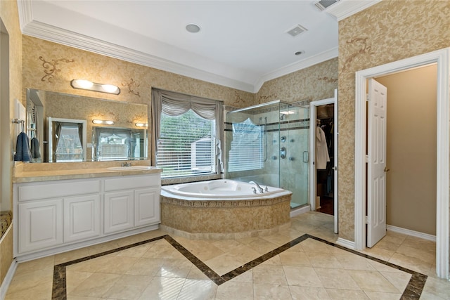 bathroom with a stall shower, ornamental molding, baseboards, a bath, and vanity