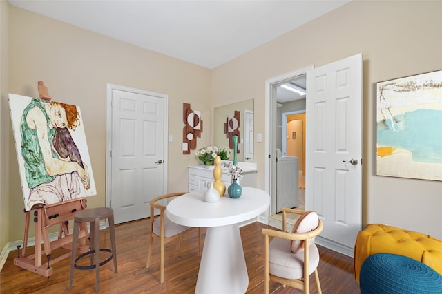 dining area with wood finished floors