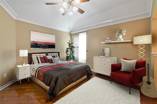 bedroom featuring crown molding, baseboards, vaulted ceiling, wood finished floors, and a ceiling fan