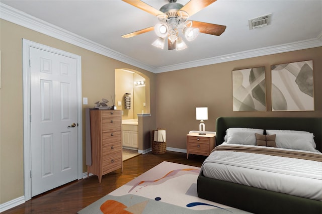 bedroom with visible vents, ornamental molding, dark wood-style floors, arched walkways, and baseboards