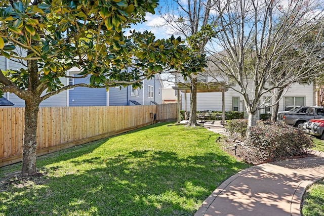 view of yard featuring a fenced backyard