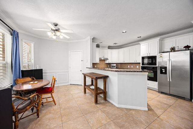 kitchen featuring light tile patterned floors, white cabinetry, black appliances, and ornamental molding