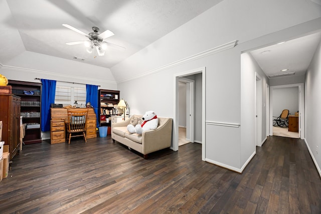 interior space with visible vents, a ceiling fan, hardwood / wood-style flooring, baseboards, and vaulted ceiling