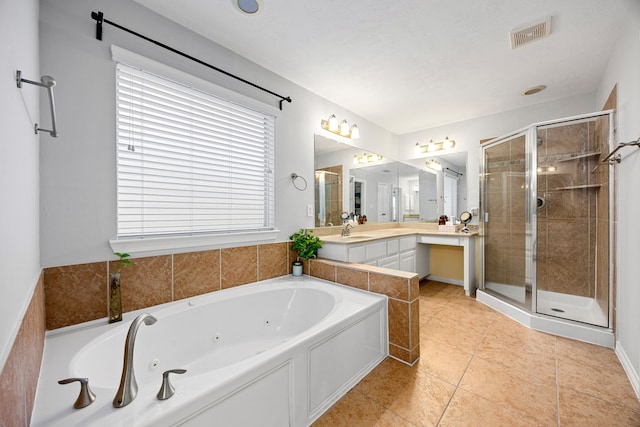 bathroom with vanity, visible vents, a shower stall, tile patterned floors, and a jetted tub