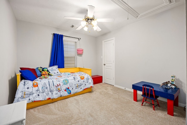 bedroom featuring visible vents, baseboards, attic access, carpet flooring, and a ceiling fan