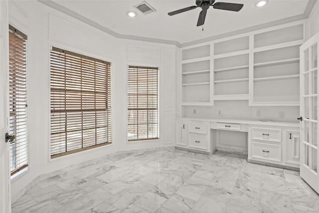 unfurnished office with recessed lighting, visible vents, marble finish floor, and built in study area