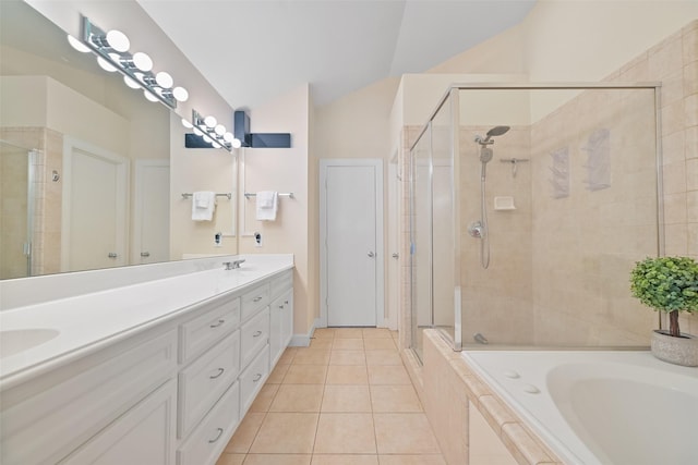 bathroom featuring tile patterned flooring, vaulted ceiling, and a stall shower