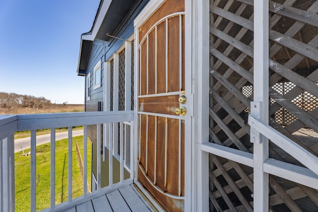 wooden deck with an outdoor structure