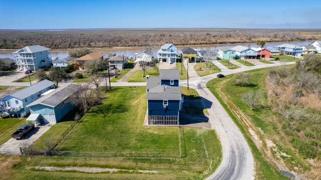 aerial view featuring a residential view and a water view