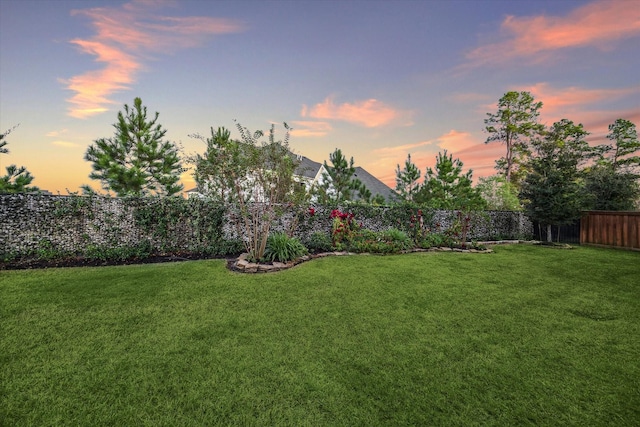 view of yard featuring a fenced backyard