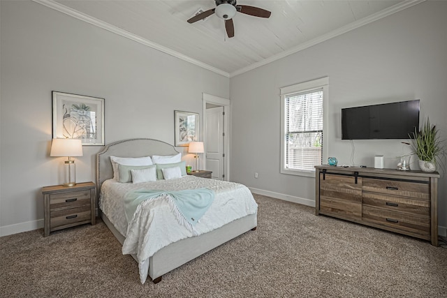 carpeted bedroom featuring a ceiling fan, baseboards, and ornamental molding