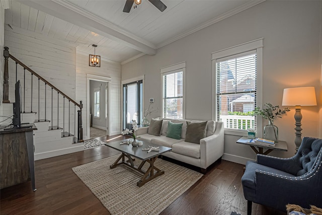 living room featuring baseboards, dark wood finished floors, stairway, beam ceiling, and a ceiling fan