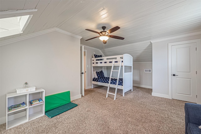 carpeted bedroom with baseboards, lofted ceiling, wood ceiling, and crown molding