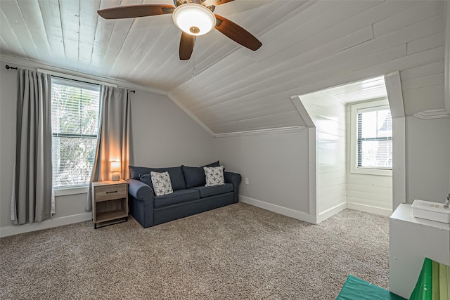 interior space featuring wooden ceiling, baseboards, lofted ceiling, and carpet