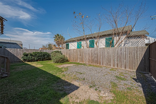 view of yard featuring a fenced backyard