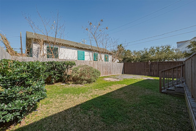 view of yard featuring a fenced backyard