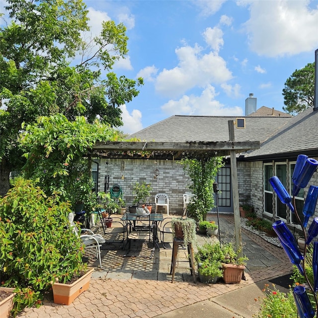 view of patio / terrace featuring a pergola