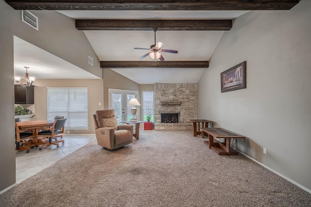 living area with light carpet, visible vents, a large fireplace, and beam ceiling