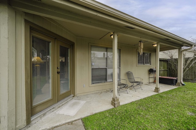 view of patio featuring fence