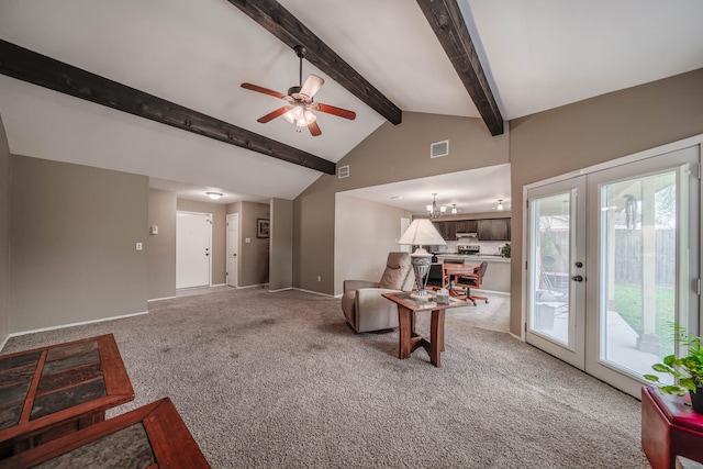 living room with beamed ceiling, french doors, high vaulted ceiling, and light carpet