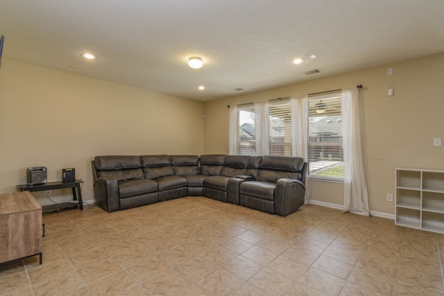 living room with recessed lighting, baseboards, visible vents, and light tile patterned floors