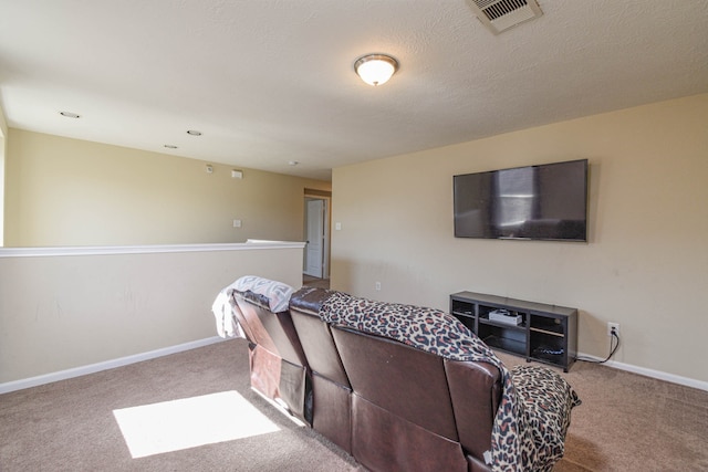 living room with visible vents, baseboards, and carpet flooring