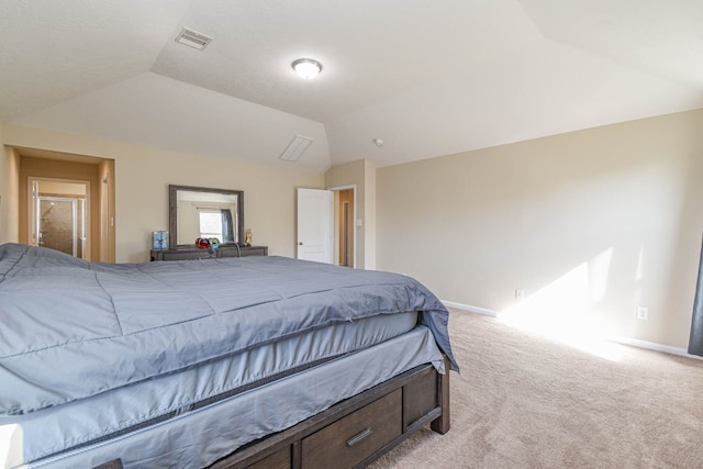 bedroom with light carpet, visible vents, baseboards, and vaulted ceiling