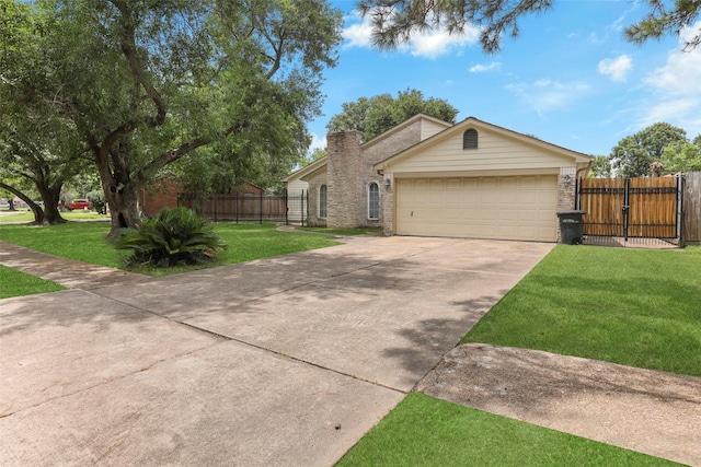 single story home featuring a gate, fence, a front lawn, concrete driveway, and brick siding