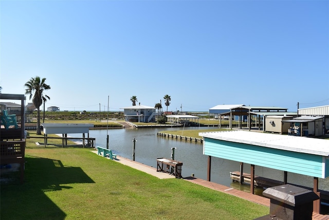 view of dock featuring a yard and a water view