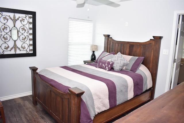 bedroom with wood finished floors, baseboards, and ceiling fan