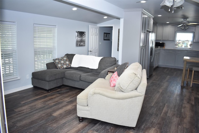 living area with a ceiling fan, baseboards, visible vents, dark wood finished floors, and recessed lighting