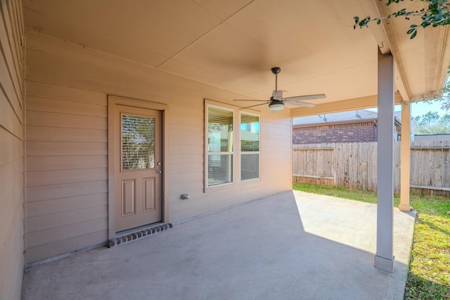 view of patio / terrace featuring a ceiling fan and fence