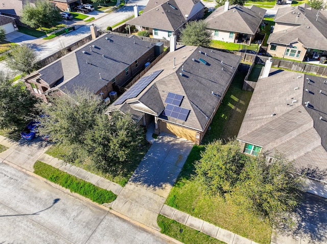 birds eye view of property with a residential view