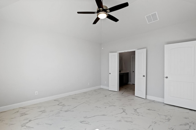 unfurnished bedroom featuring a ceiling fan, visible vents, baseboards, ensuite bath, and marble finish floor