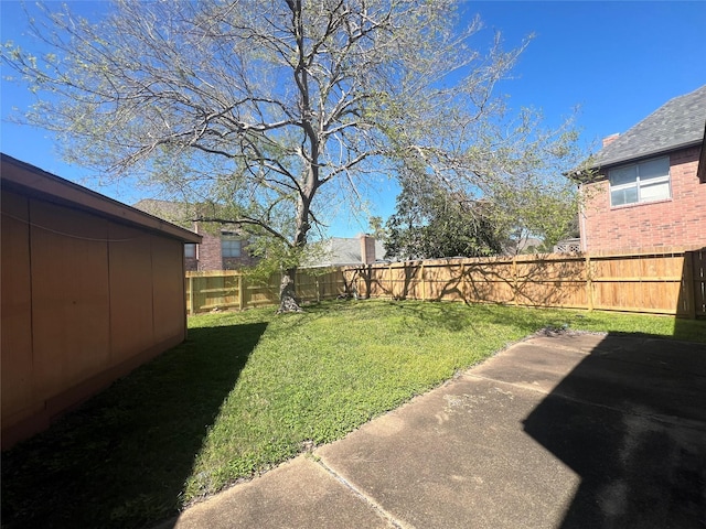 view of yard featuring a fenced backyard