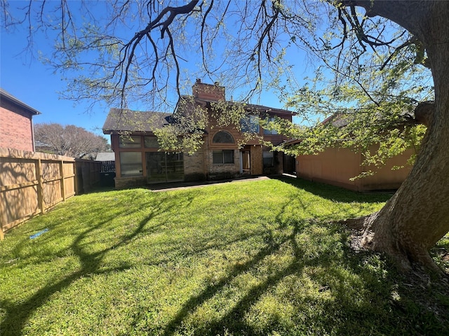 view of yard featuring a fenced backyard