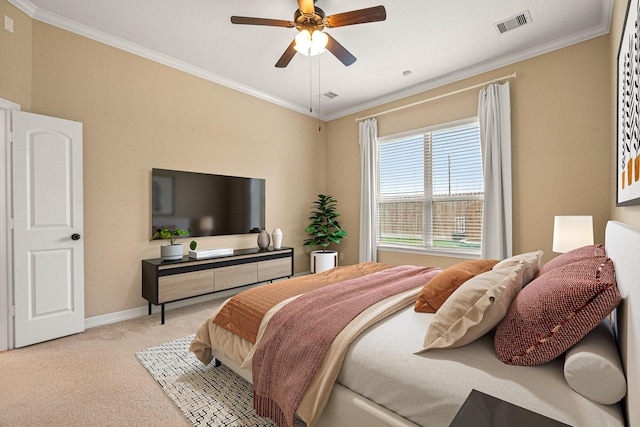 bedroom with visible vents, ornamental molding, carpet floors, baseboards, and ceiling fan