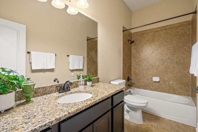 full bathroom featuring vanity, toilet, washtub / shower combination, and tile patterned flooring