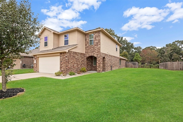 view of front of house featuring a front yard, fence, brick siding, and driveway